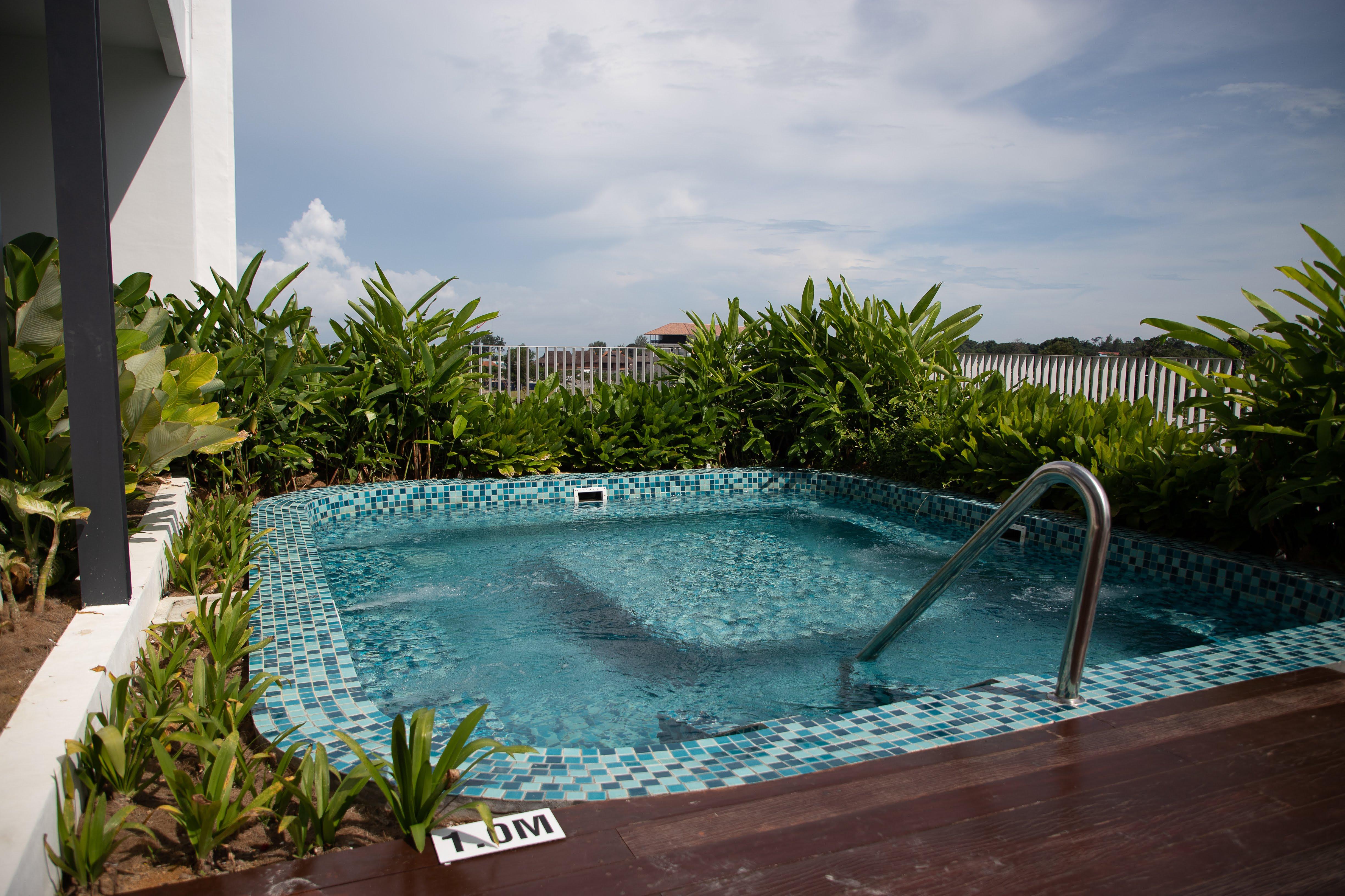 Hard Rock Hotel Desaru Coast Exterior photo A rooftop swimming pool in Singapore